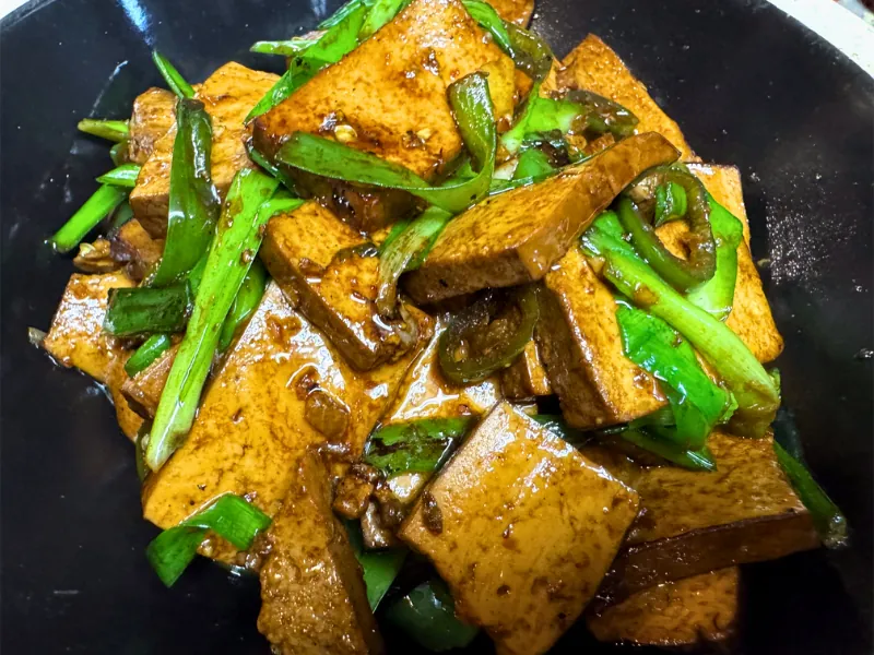 Tender tofu stir-fried with green peppers at Chef Zhang Cuisine & Bar, a Chinese Restaurant in Cambridge