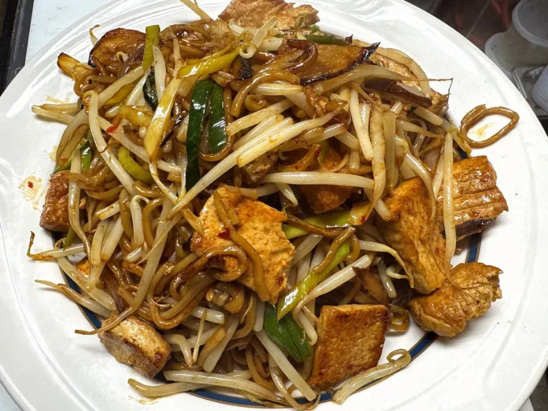 Noodles stir-fried with veggies and tofu at Chef Zhang Cuisine & Bar, a Chinese Restaurant in Cambridge